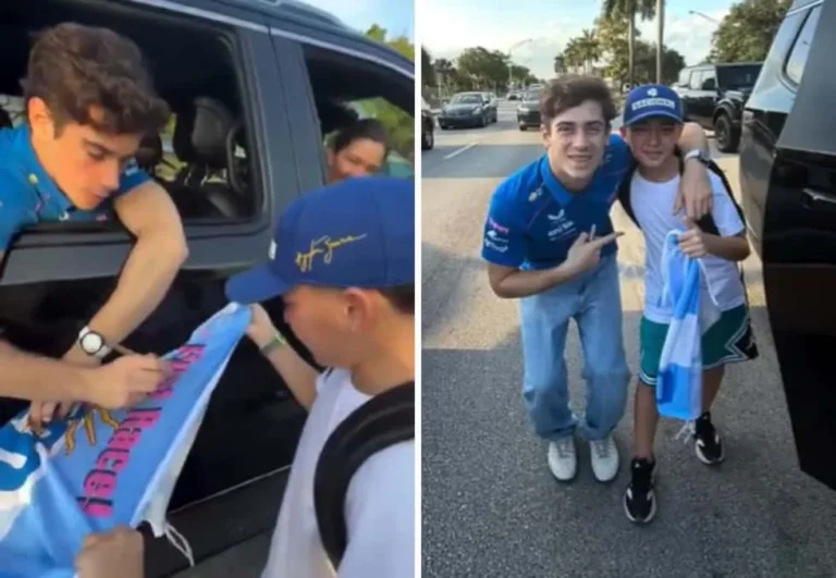 Franco Colapinto firmando una bandera argentina a un niño fanático en Miami